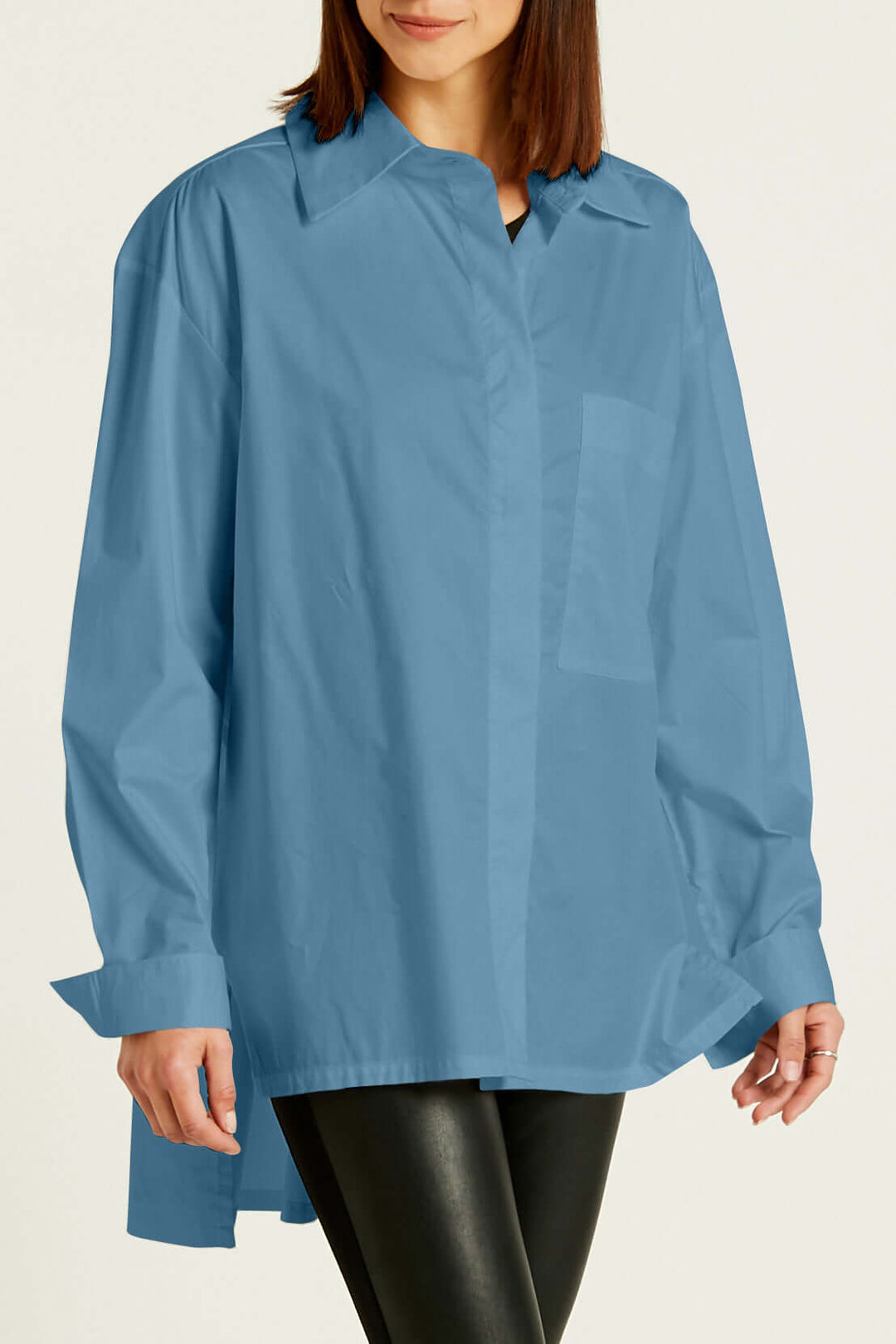 Close-up of white Cotton Kool Shirt – modern and timeless women’s wardrobe essential by Planet.