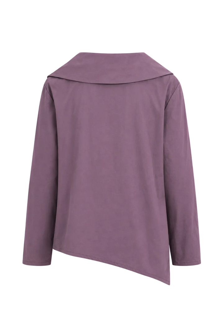 A 100% cotton dusty purple long-sleeve top with an asymmetrical, diagonal hem and a wide collar, shown from the back on a plain white background.