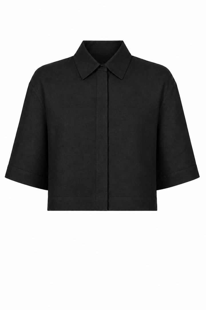A 100% linen black short-sleeve collared shirt jacket with a button-down front, displayed on a solid white background.