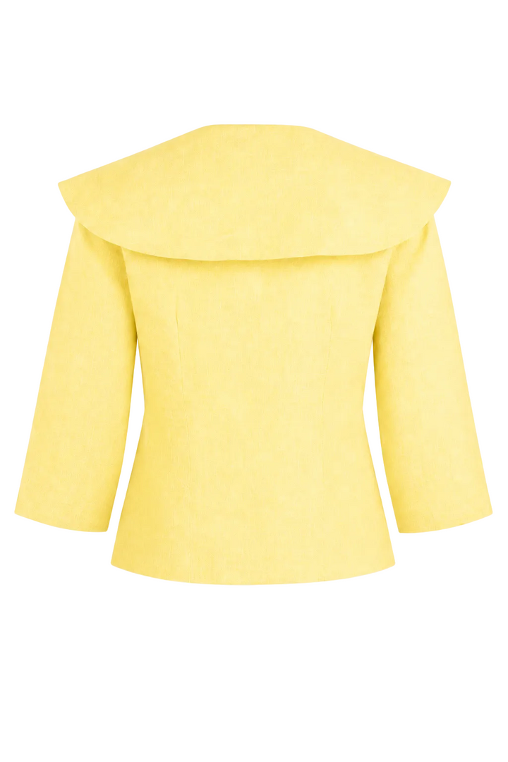 A 100% linen bright yellow women's blazer with a dramatic wide collar and three-quarter sleeves, shown from the back against a plain white background.