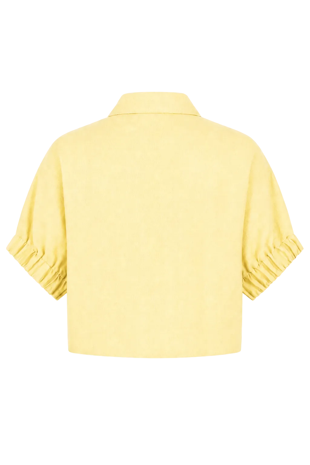 A 100% linen pale yellow short-sleeve collared top shown from the back, featuring gathered ruffle detailing at the cuffs, set against a plain white background.