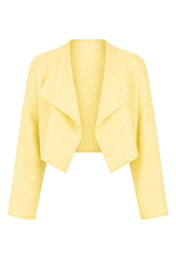 A 100% linen pale yellow cropped jacket with a draped, open-front design and long sleeves, shown against a plain white background.