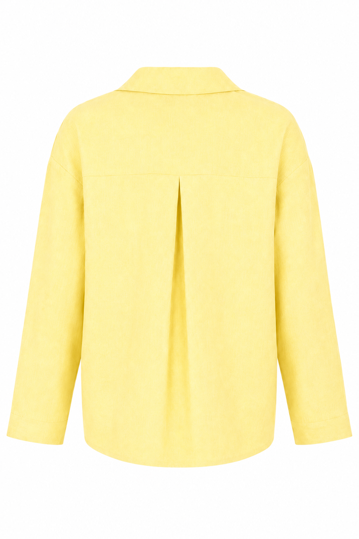A banana yellow long-sleeve linen button-up shirt shown from the back, featuring a central pleat detail, on a plain white background.