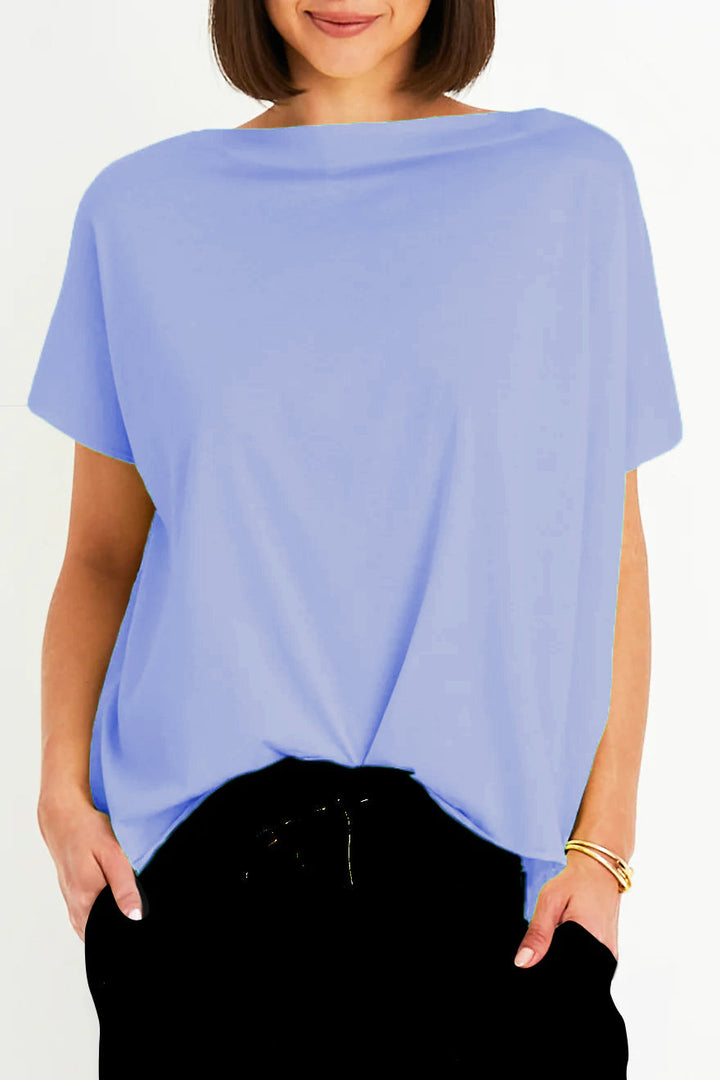 Woman wearing a light purple oversized Pima cotton t-shirt against a white background