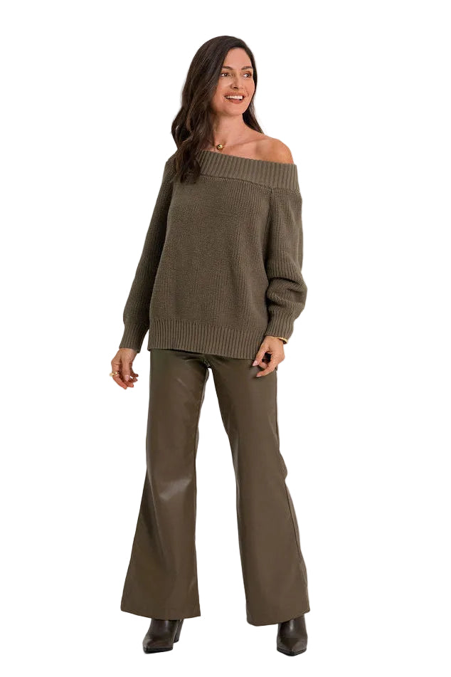 A woman modeling a matching two-piece outfit consisting of an off-the-shoulder long-sleeve knit sweater and wide-leg flared trousers, both in a muted olive-brown color, set against a plain white studio background.