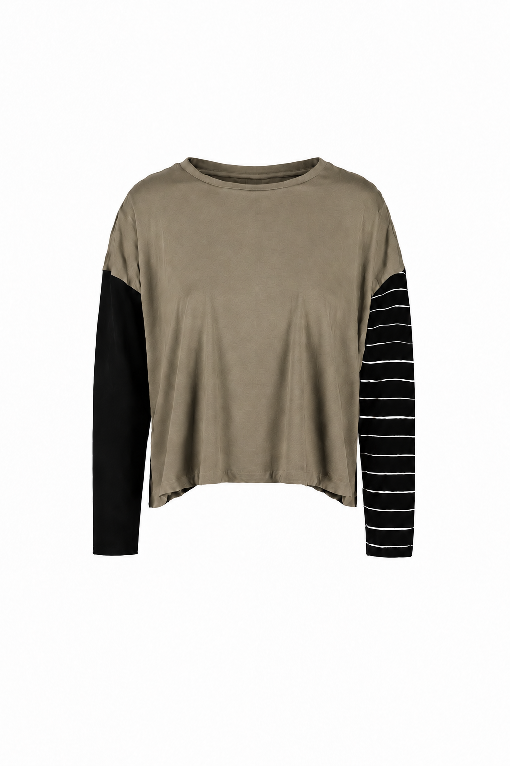 A women's long-sleeve crop top in turtle with solid black sleeves on one side and black-and-white striped sleeves on the other, shown against a plain white background.