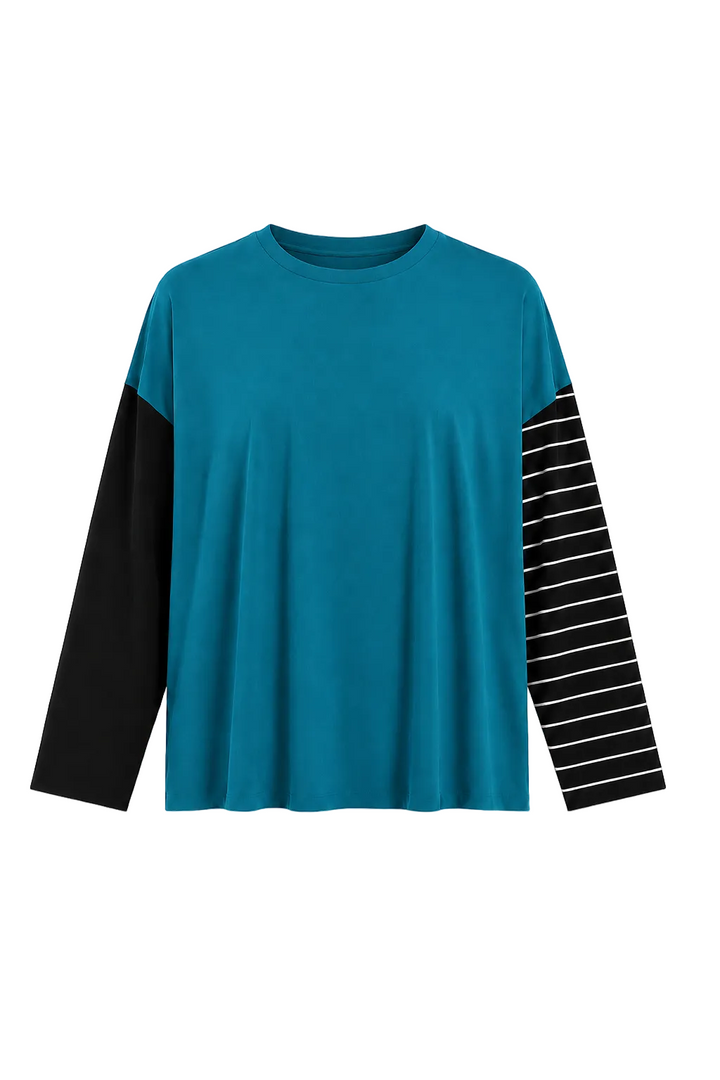 A 100% pima cotton long-sleeve crewneck top in teal blue with solid black sleeves on one side and black and white striped sleeves on the other, shown against a plain white background.