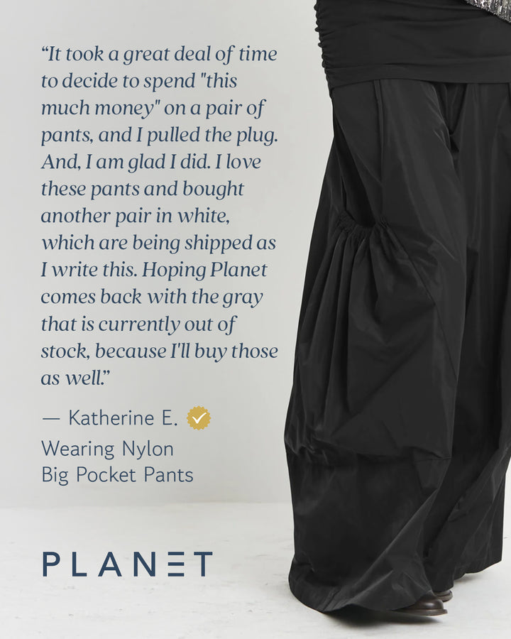 Black big pocket pants with a quote from Katherine E. about her purchase, displayed on a white background with 'Planet' branding.